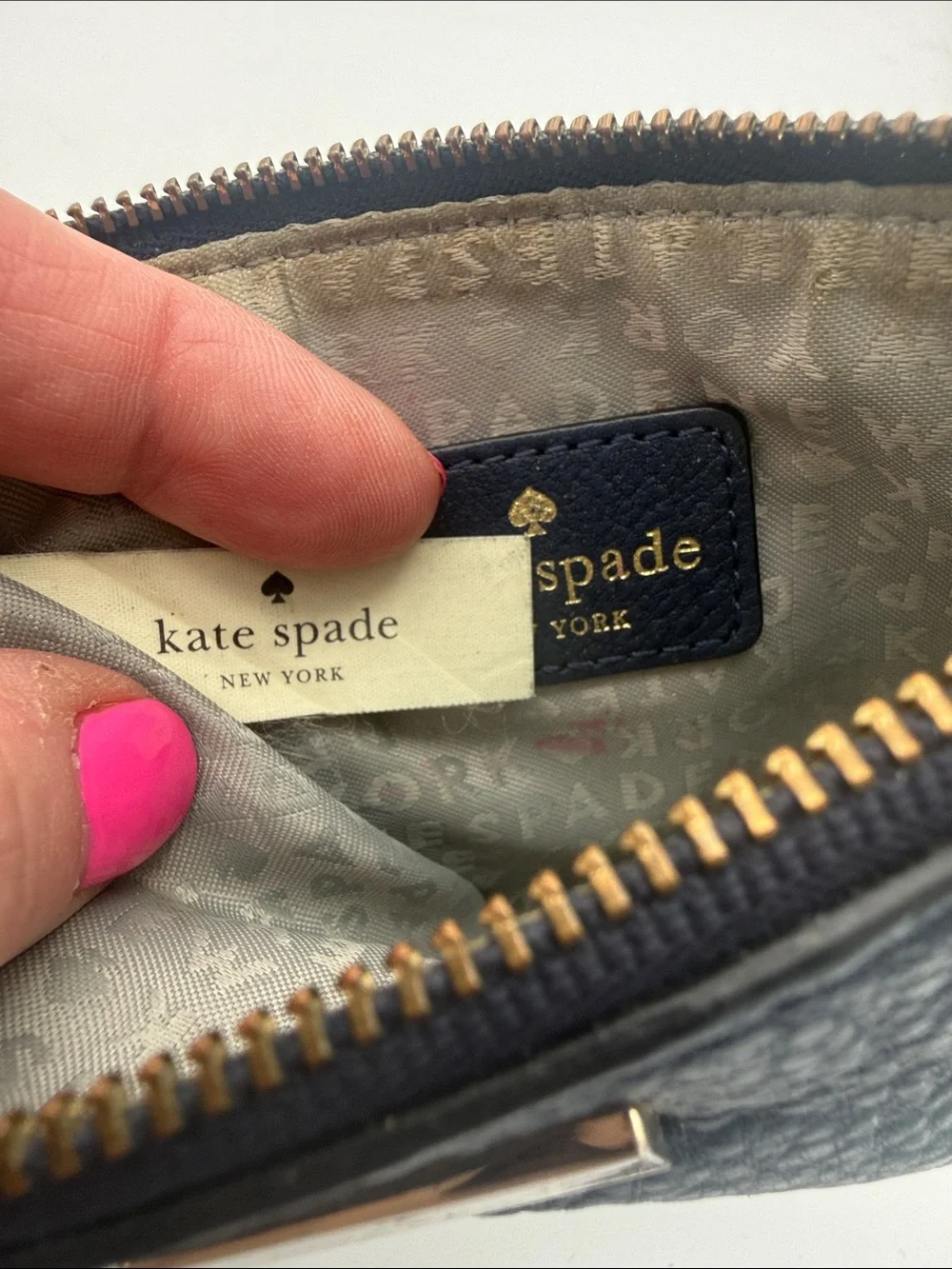 kate spade navy pebbled leather wristlet wi/  gold logo 6.5x4”